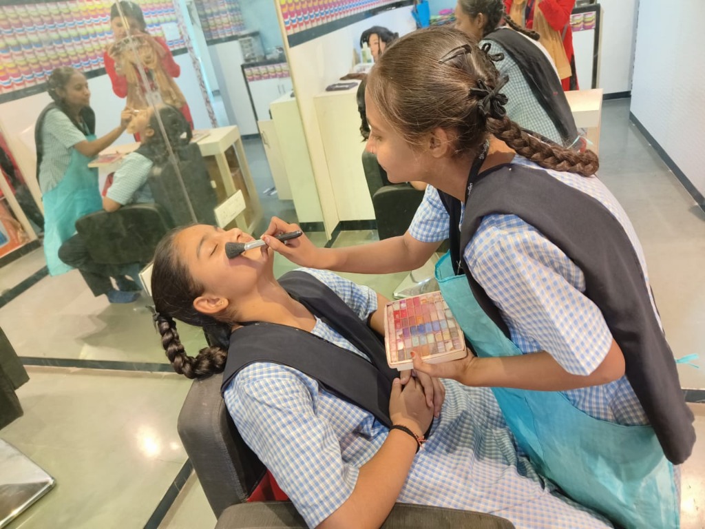 Student learning cosmetics in beauty parlour